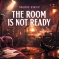 Cinematic studio banner with vintage microphones, red curtains, smoky light, and the text “THE ROOM IS NOT READY.”